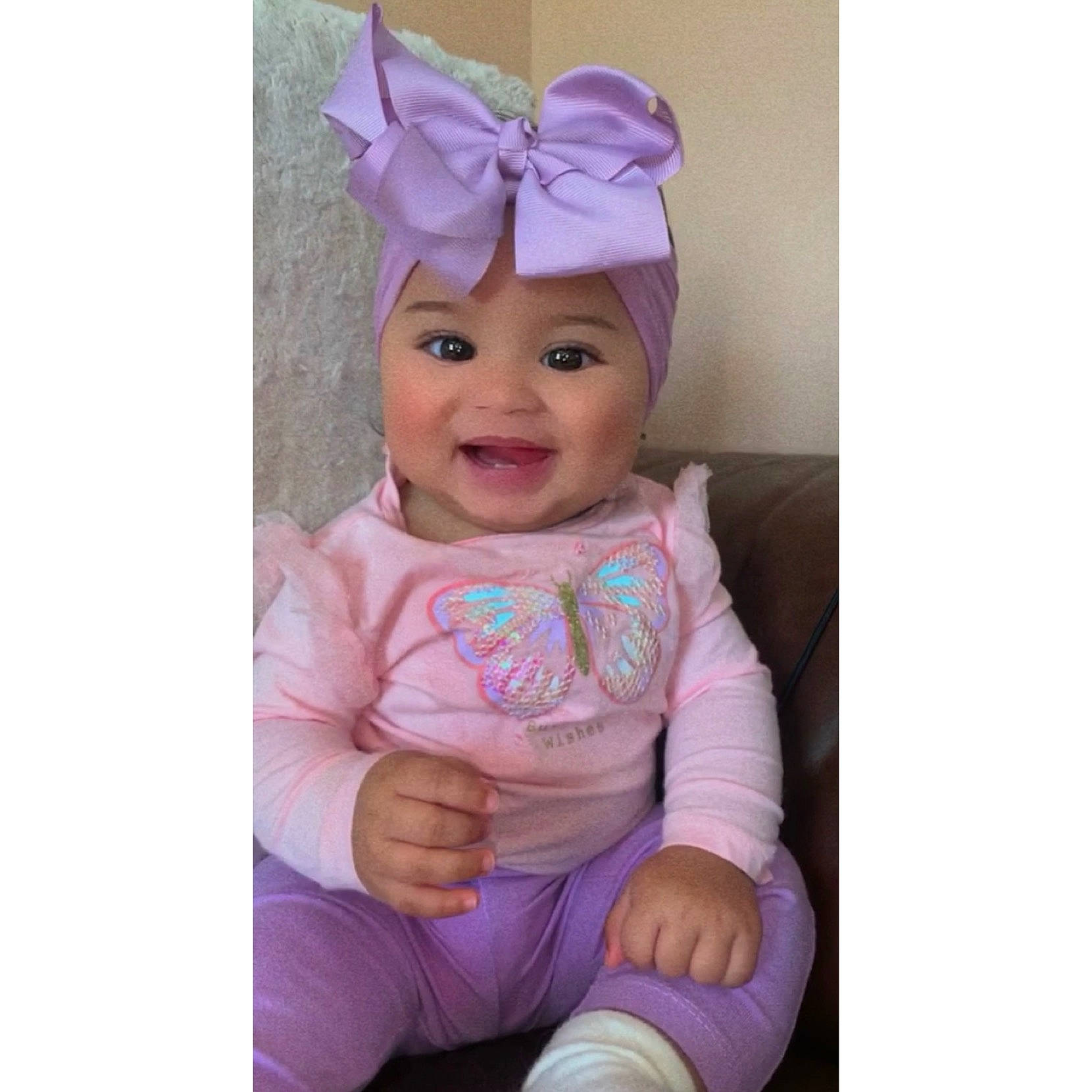 Suraya joined the competition — help win amazing prizes! baby, baby_toddler_clothing, bonnet, costume, costume_accessory, costume_hat, eye, hair_accessory, headband, headgear, headpiece, headwear, joy, lavender, person, pink, purple, sock, violet