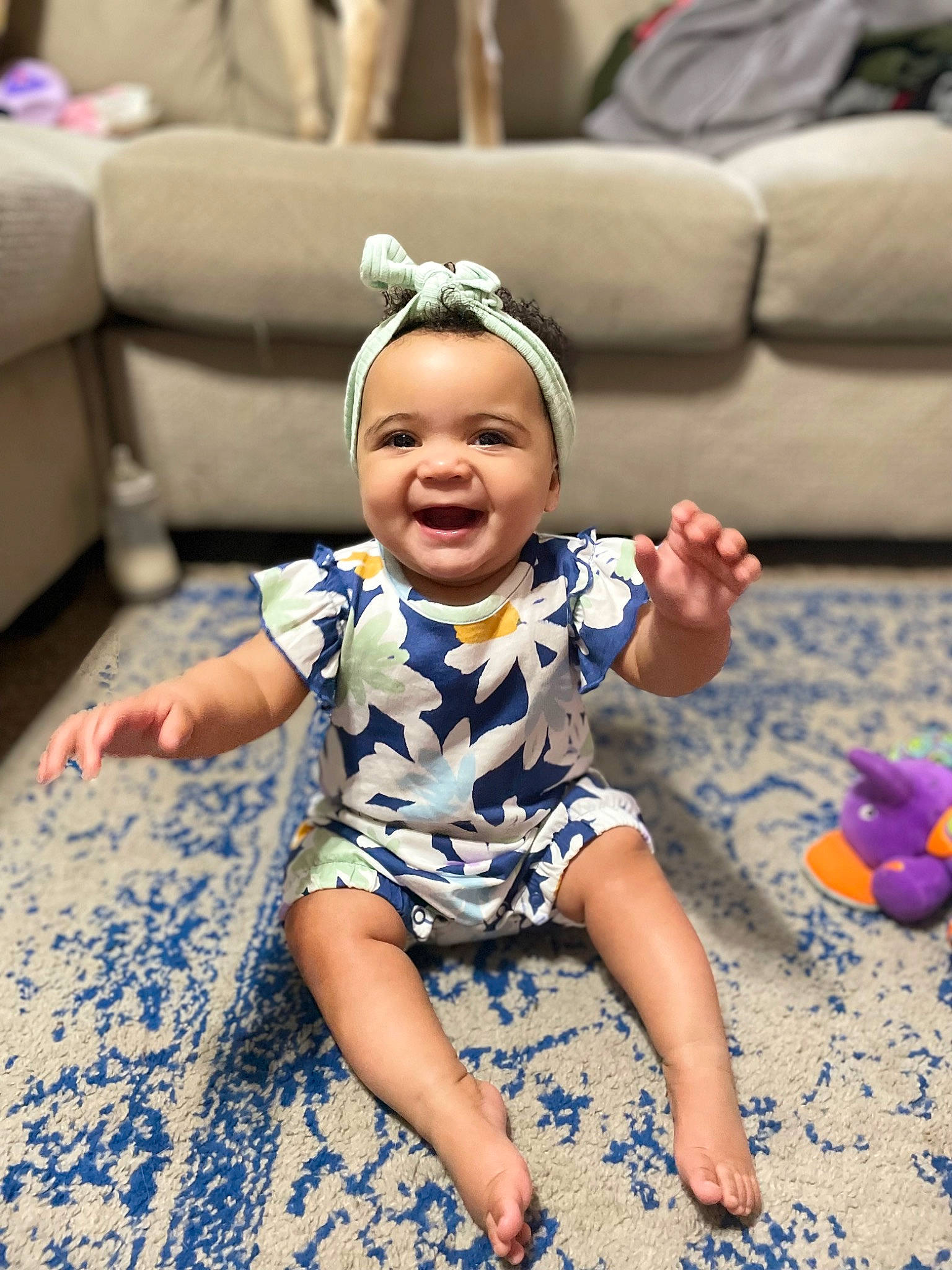 Aleigha joined the competition — help win amazing prizes! baby, baby_toddler_clothing, barefoot, blue, child, couch, electric_blue, fashion_accessory, flooring, foot, fun, happy, headband, jewellery, joy, pattern, person, purple, sitting, sleeve