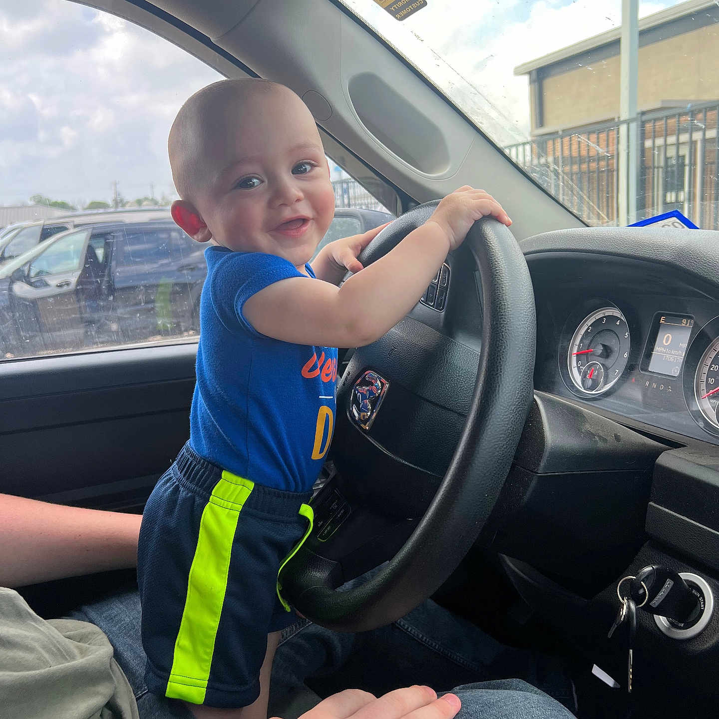 Liam joined the competition — help win amazing prizes! bodypart, boy, car, child, clothing, driving, face, finger, hand, head, machine, male, pants, person, photography, portrait, sitting, transportation, vehicle, wheel