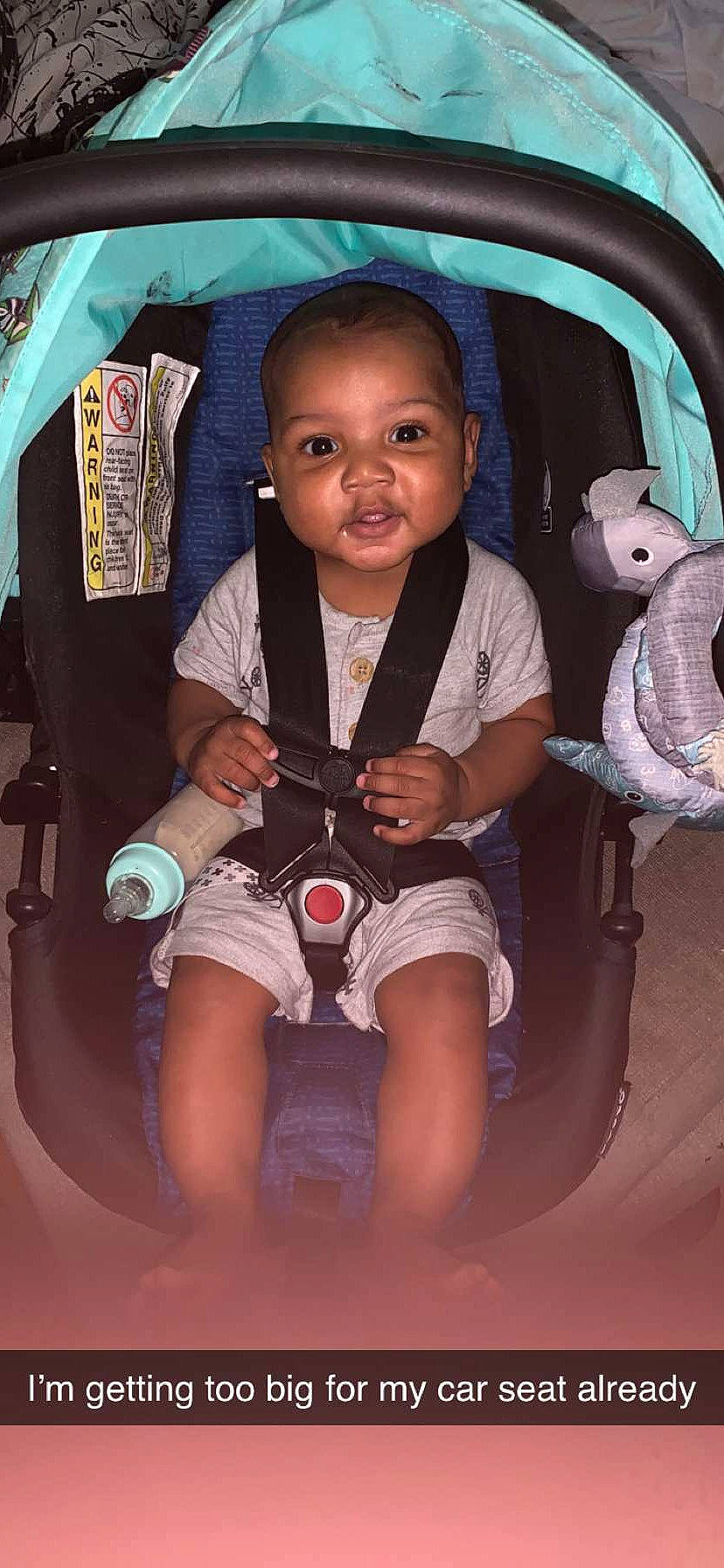 Martel is registered to the contest to win money with this photo: baby, baby_carriage, baby_products, baby_toddler_clothing, car_seat, child, cool, fun, happy, leisure, person, pink, shorts, sitting, skin, smile, t_shirt, thigh, toddler, toy