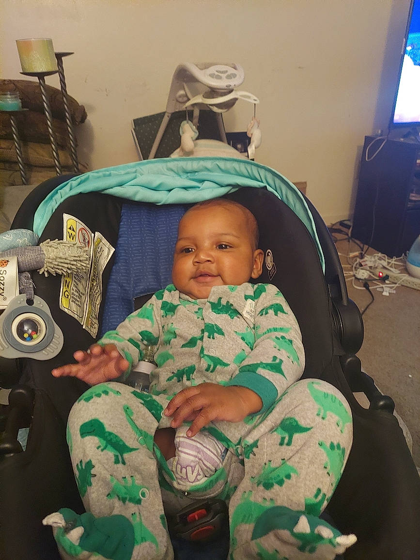 Martel joined the competition — help win amazing prizes! baby, baby_carriage, baby_products, baby_safety, baby_toddler_clothing, chair, cheek, child, comfort, eye, facial_expression, fun, happy, lap, person, personal_protective_equipment, room, sitting, skin, toddler