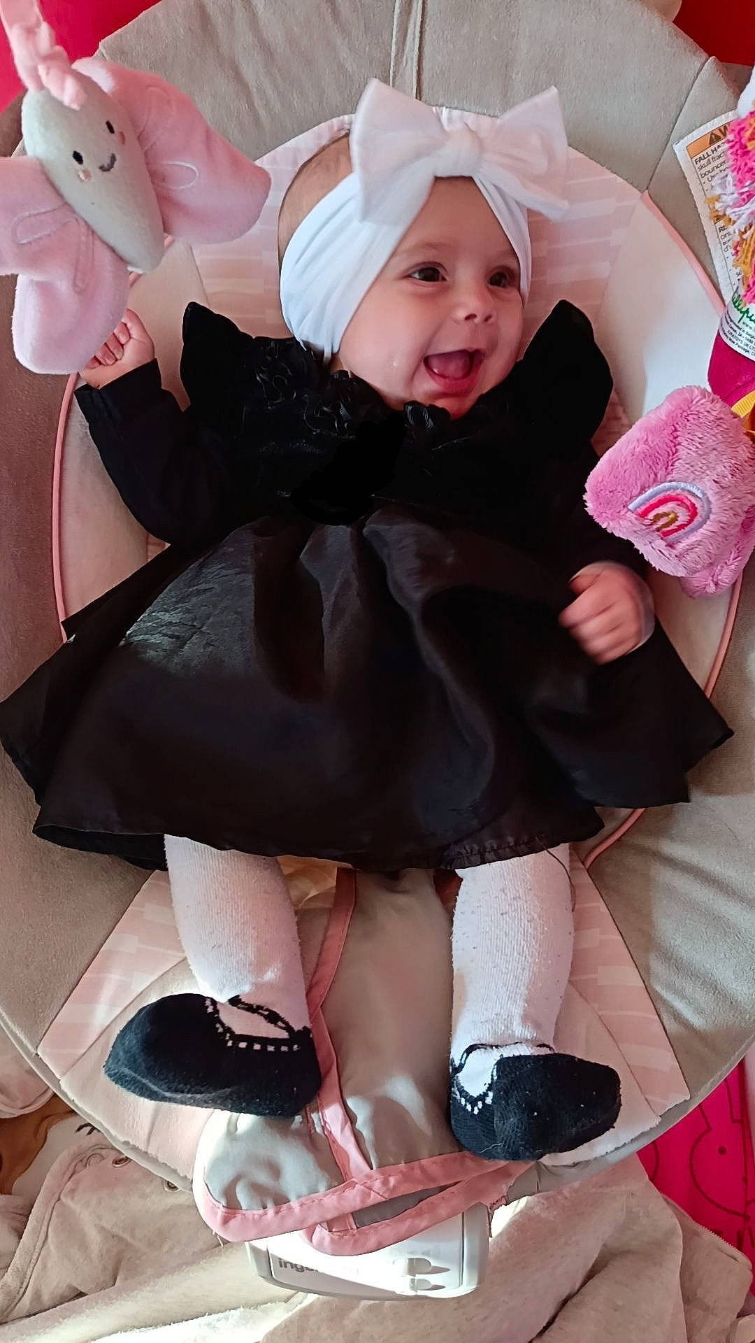 baby, bonnet, clothing, coat, costume, couch, dress, face, footwear, furniture, glove, happy, hat, head, person, photography, portrait, shoe, sitting, smile