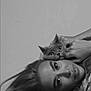 Ahmed Azzi a rejoint le concours — aidez-le/la à gagner de superbes lots ! animal, black_and_white, calm, cat, closeup, companion, emotion, expression, eyes, face, hair, hands, indoor, intimate, laying_down, monochrome, pet, portrait, soft_light, woman