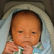 Twahn joined the competition — help win amazing prizes! newborn, baby, infant, wrapped, blanket, blue, face, hand, sleepwear, cute, portrait, young, child, closeup, soft, indoors, peaceful, expression, skin, human