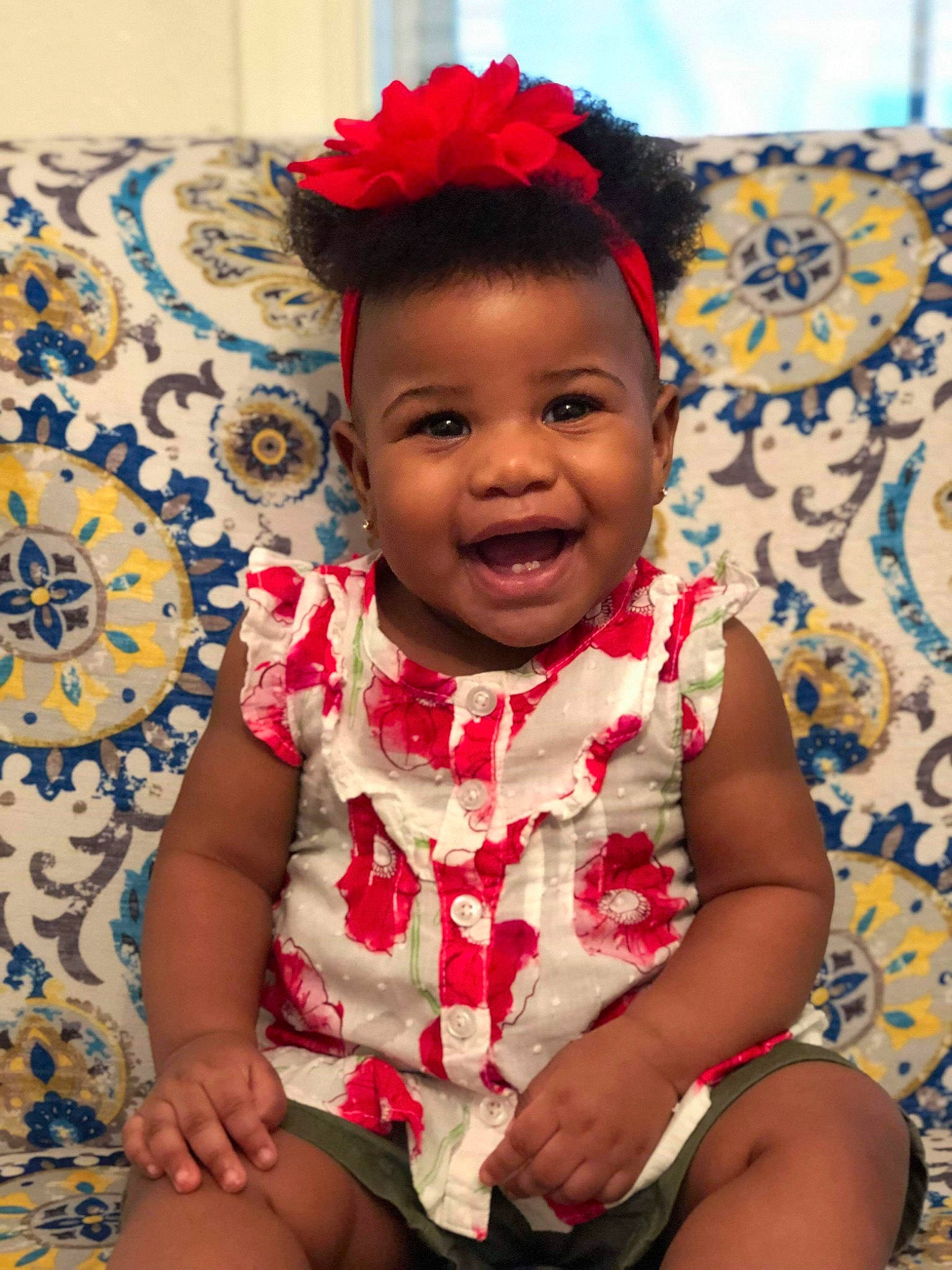 Devyn is registered to the contest to win money with this photo: baby, baby_toddler_clothing, cheek, child, fashion_accessory, hair_accessory, happy, head, headband, person, pink, sitting, skin, smile, textile, toddler