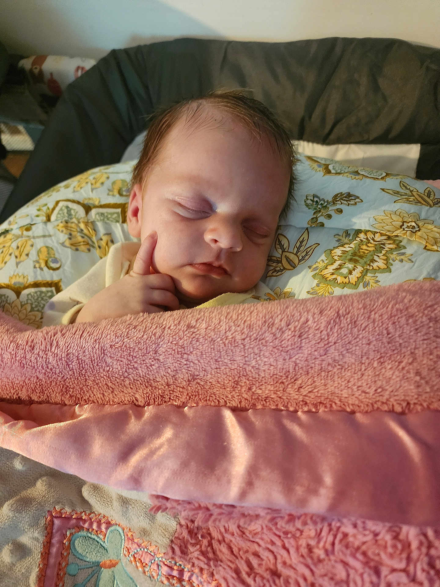 Evie joined the competition — help win amazing prizes! baby, newborn, infant, sleeping, closed_eyes, face, hand, finger, blanket, pink_blanket, pillow, bedding, floral_pattern, soft_texture, cozy, portrait, bed, home_interior, cute, peaceful