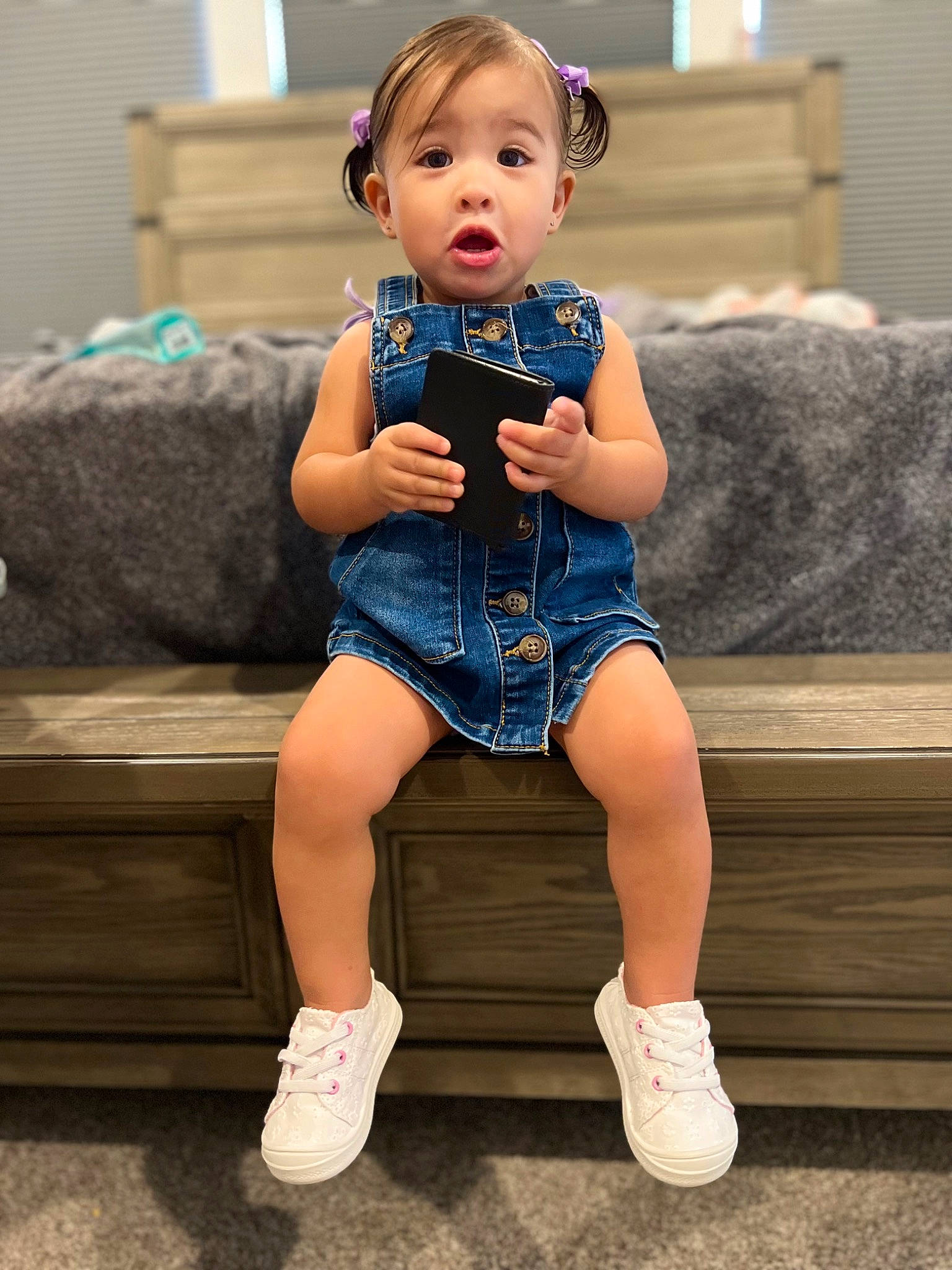 Oceana is registered to the contest to win money with this photo: azure, baby_toddler_clothing, couch, dress, eye, face, flash_photography, footwear, hair, happy, head, knee, person, shoe, shorts, skin, sleeve, standing, surprise, thigh