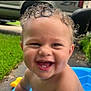 Carter joined the competition — help win amazing prizes! toddler, child, smiling, happy, wet_hair, curly_hair, blue_tub, outdoor, grass, sidewalk, car, face, skin, teeth, sunlight, water, play, summer, baby, portrait