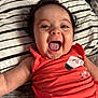 Denali Selah joined the competition — help win amazing prizes! baby, infant, smiling, happy, face, child, clothing, orange, sleeveless, bed, striped_bed_sheet, hair, mouth_open, joy, cute, lying_down, portrait, skin, person, indoors