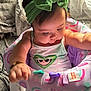 Denali Selah joined the competition — help win amazing prizes! baby, child, headband, green_bow, sitting, infant, indoors, sunlight, colorful, seat, clothing, cute, portrait, soft_light, bracelet, fabric, toy, expression, home, playtime