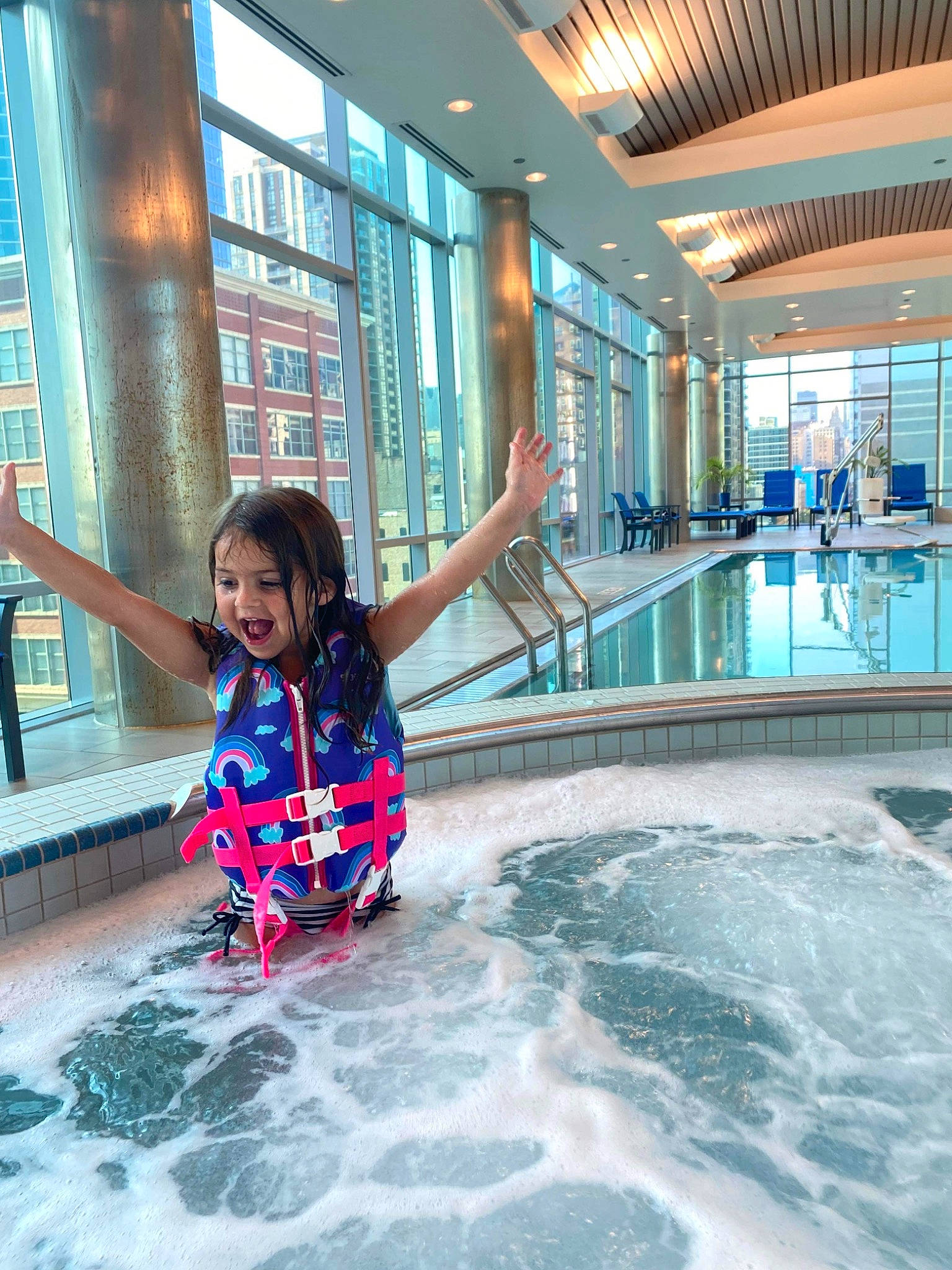 Mila joined the competition — help win amazing prizes! building, child, flooring, fun, happy, indoor_games_and_sports, leisure, leisure_centre, metal, person, personal_protective_equipment, recreation, smile, sports, swimming_pool, t_shirt, toddler, tourism, travel, vacation