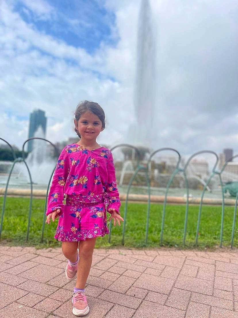 Mila joined the competition — help win amazing prizes! child, cloud, day_dress, dress, fence, fun, grass, happy, joy, leisure, magenta, people_in_nature, person, plant, recreation, sky, smile, summer, toddler, travel