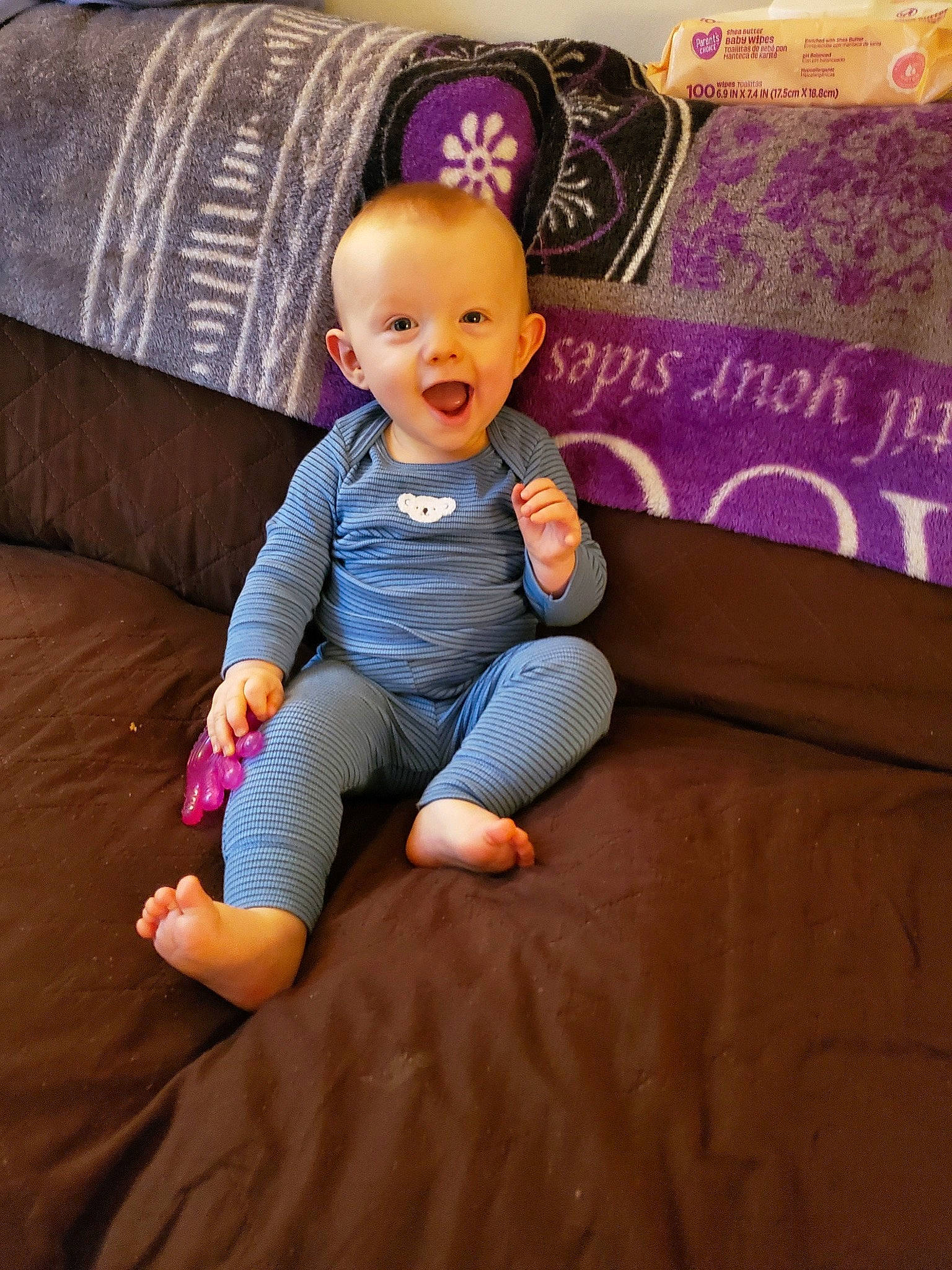 Liam Cooper Hall is registered to the contest to win money with this photo: baby, cheek, child, fun, furniture, person, pink, play, purple, sitting, skin, toddler, toy, violet