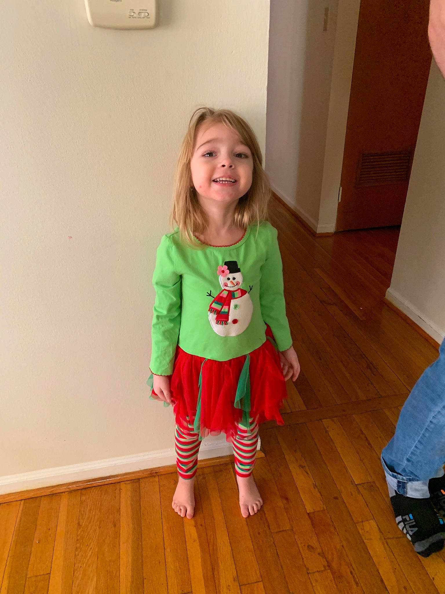 Maci Marie is registered to the contest to win money with this photo: child, floor, flooring, joy, outerwear, pajamas, person, play, sleeve, smile, standing, t_shirt, toddler