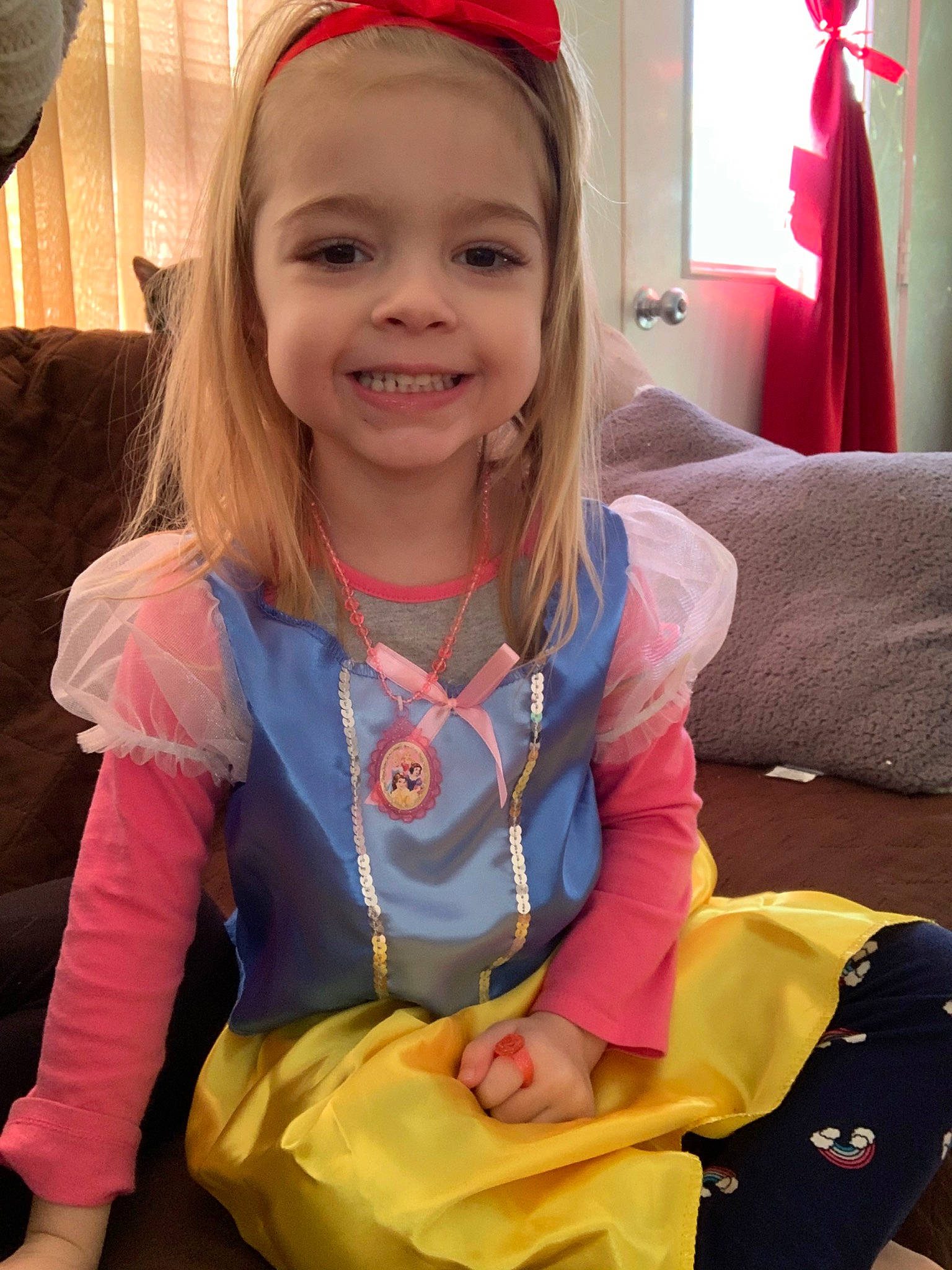 Maci Marie is registered to the contest to win money with this photo: child, ear, fun, hair_accessory, headband, headgear, joy, person, skin, smile, toddler, tooth