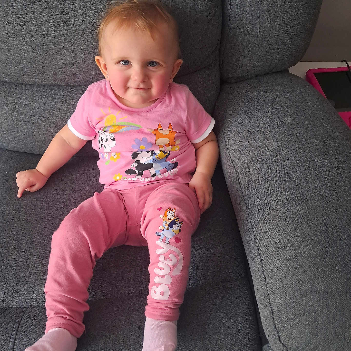 Scarlet is registered to the contest to win money with this photo: architecture, armchair, baby, building, chair, clothing, couch, cushion, face, furniture, head, homedecor, hosiery, pants, person, photography, portrait, sitting, sock, t_shirt