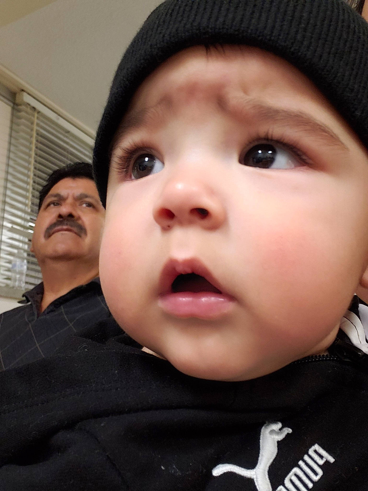Gustavo is registered to the contest to win money with this photo: baby, cheek, child, chin, eye, eyebrow, eyelash, face, facial_expression, forehead, head, headgear, lip, mouth, nose, person, skin, smile, toddler
