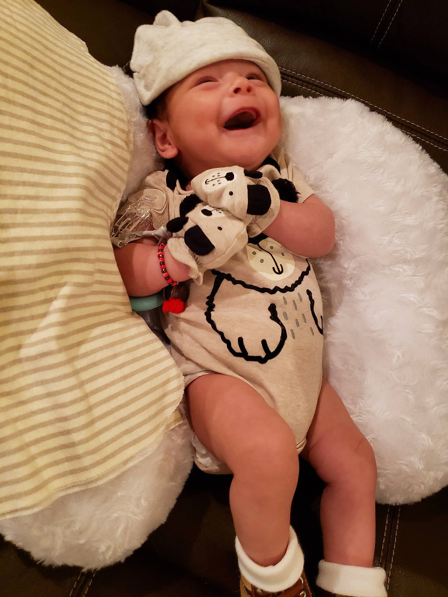 Gustavo is registered to the contest to win money with this photo: baby, child, hat, headgear, headwear, leg, person, skin, teddy_bear, toddler