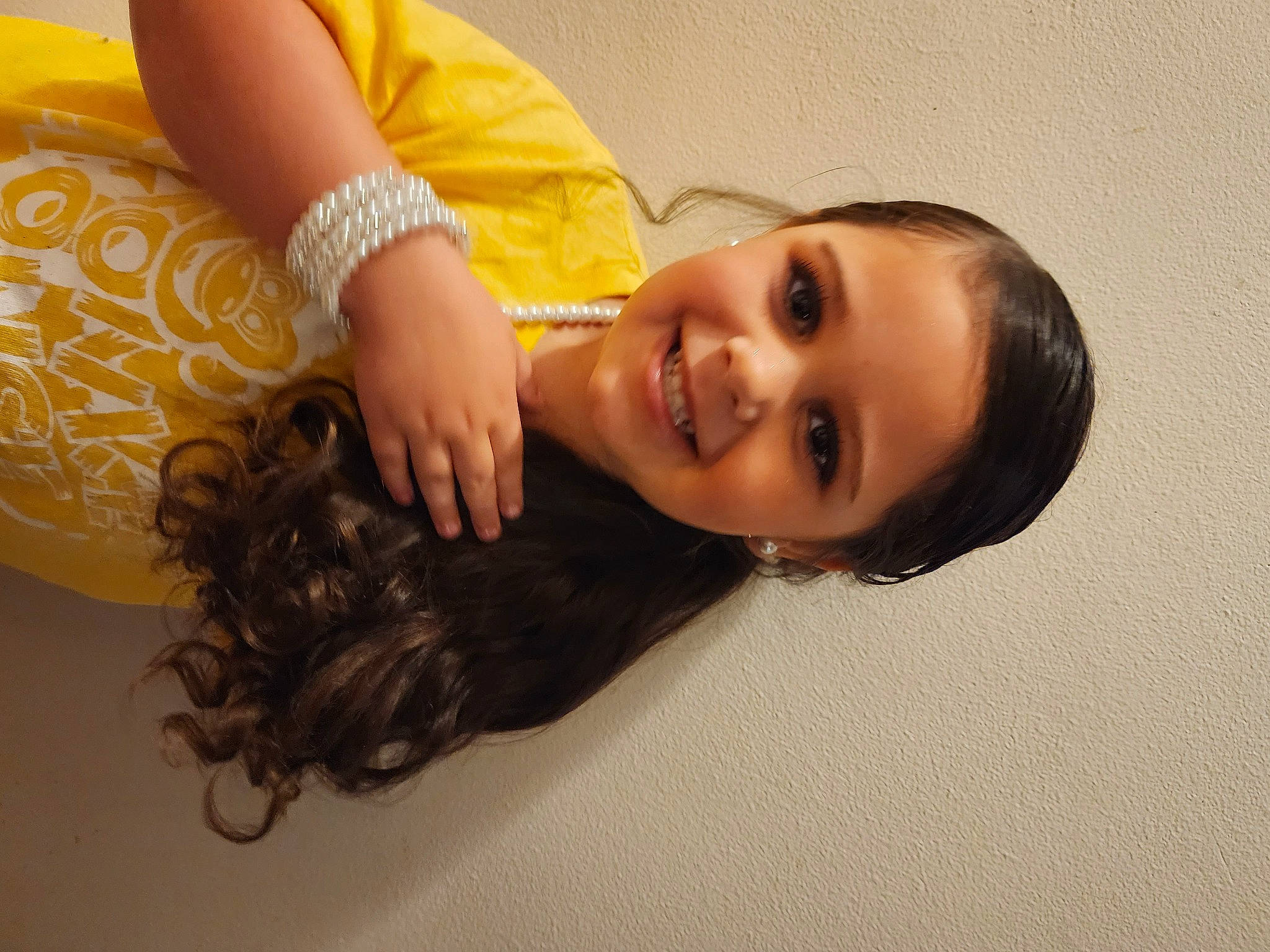 Brooklynn joined the competition — help win amazing prizes! arm, black_hair, dress, ear, eyelash, flash_photography, floor, flooring, gesture, hand, happy, human_body, iris, joint, joy, lip, neck, nose, person, shoulder