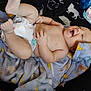 Maximus joined the competition — help win amazing prizes! baby, blanket, diaper, baby_wipes, happy, smiling, infant, legs, hand, face, skin, lying_down, cozy, pattern, animal_print, soft, child, indoors, care, comfort