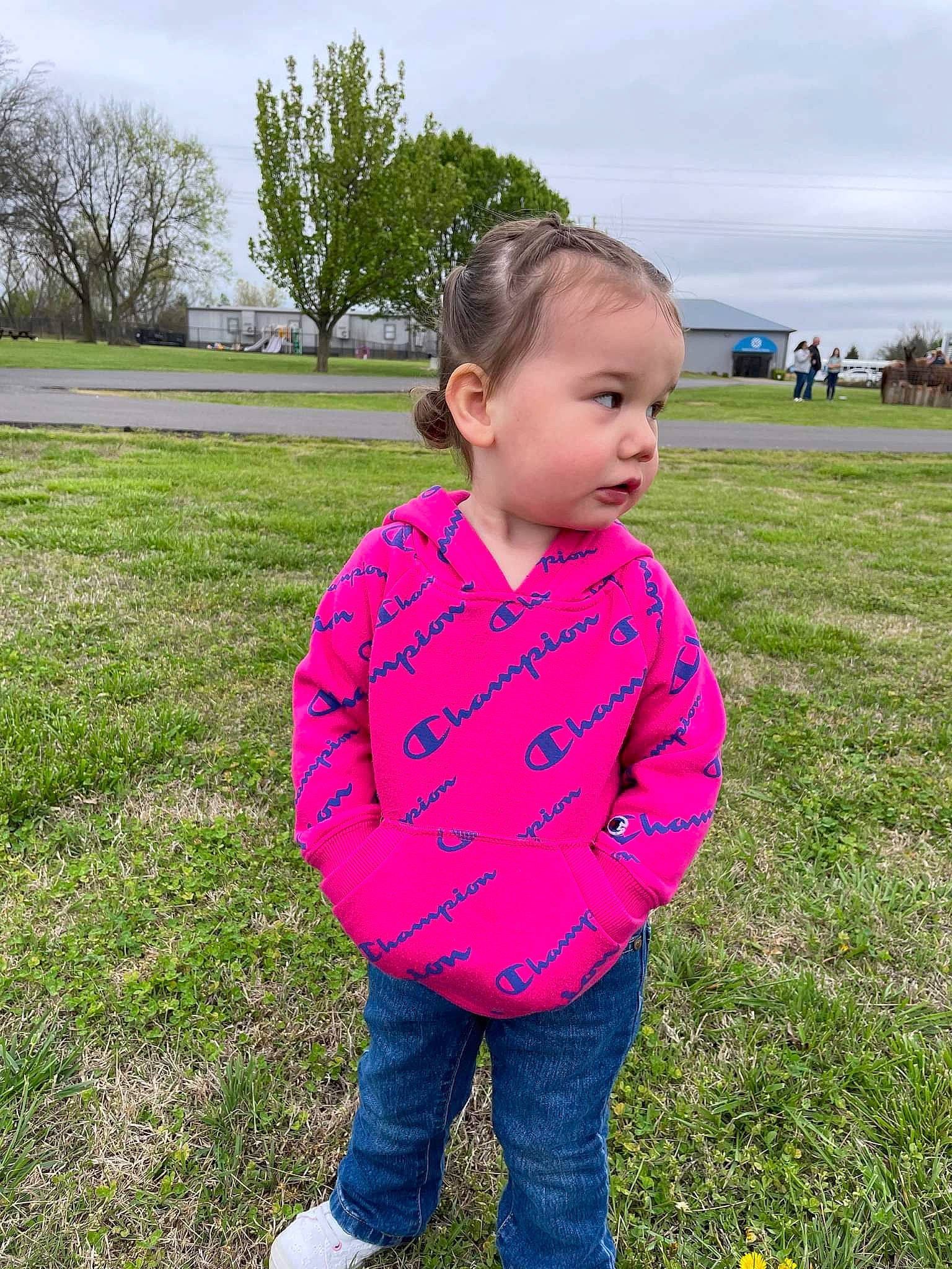 Aaliyah is registered to the contest to win money with this photo: baby_toddler_clothing, child, electric_blue, eye, fun, grass, grassland, happy, jeans, leisure, magenta, meadow, people_in_nature, person, plant, recreation, sky, sleeve, toddler, tree