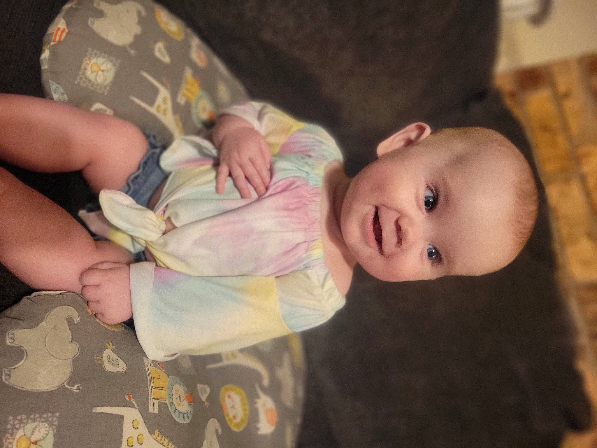 Trinity is registered to the contest to win money with this photo: baby, baby_products, baby_toddler_clothing, cheek, child, comfort, eyelash, gesture, human_body, lip, mammal, nail, nose, people, person, room, sitting, skin, sleeve, toddler