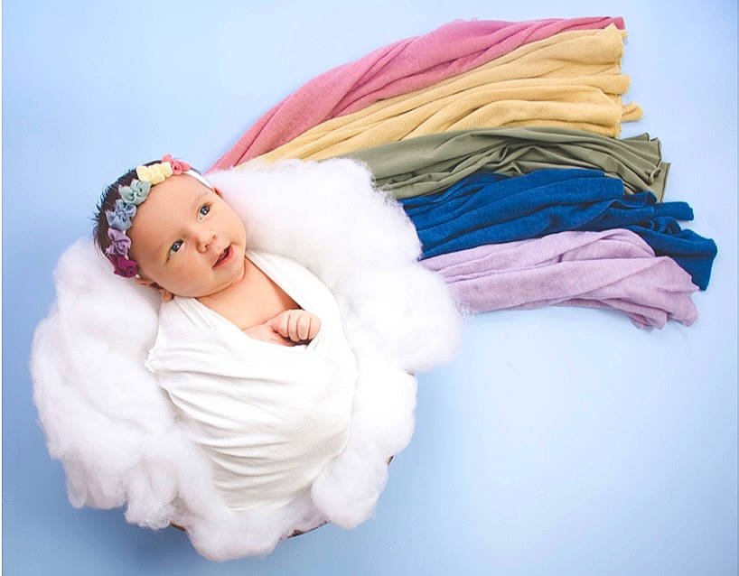 Brielle is registered to the contest to win money with this photo: abdomen, arm, baby, baby_products, baby_sleeping, bedding, child, comfort, fashion_accessory, fur, happy, headwear, human_body, jewellery, linens, nail, nap, person, sitting, textile