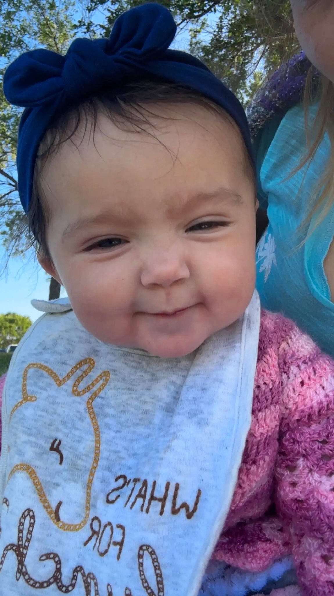 Melani joined the competition — help win amazing prizes! baby, blue, cheek, chin, eyebrow, eyelash, facial_expression, forehead, grass, hairstyle, happy, iris, joy, lip, neck, nose, person, pink, product, skin