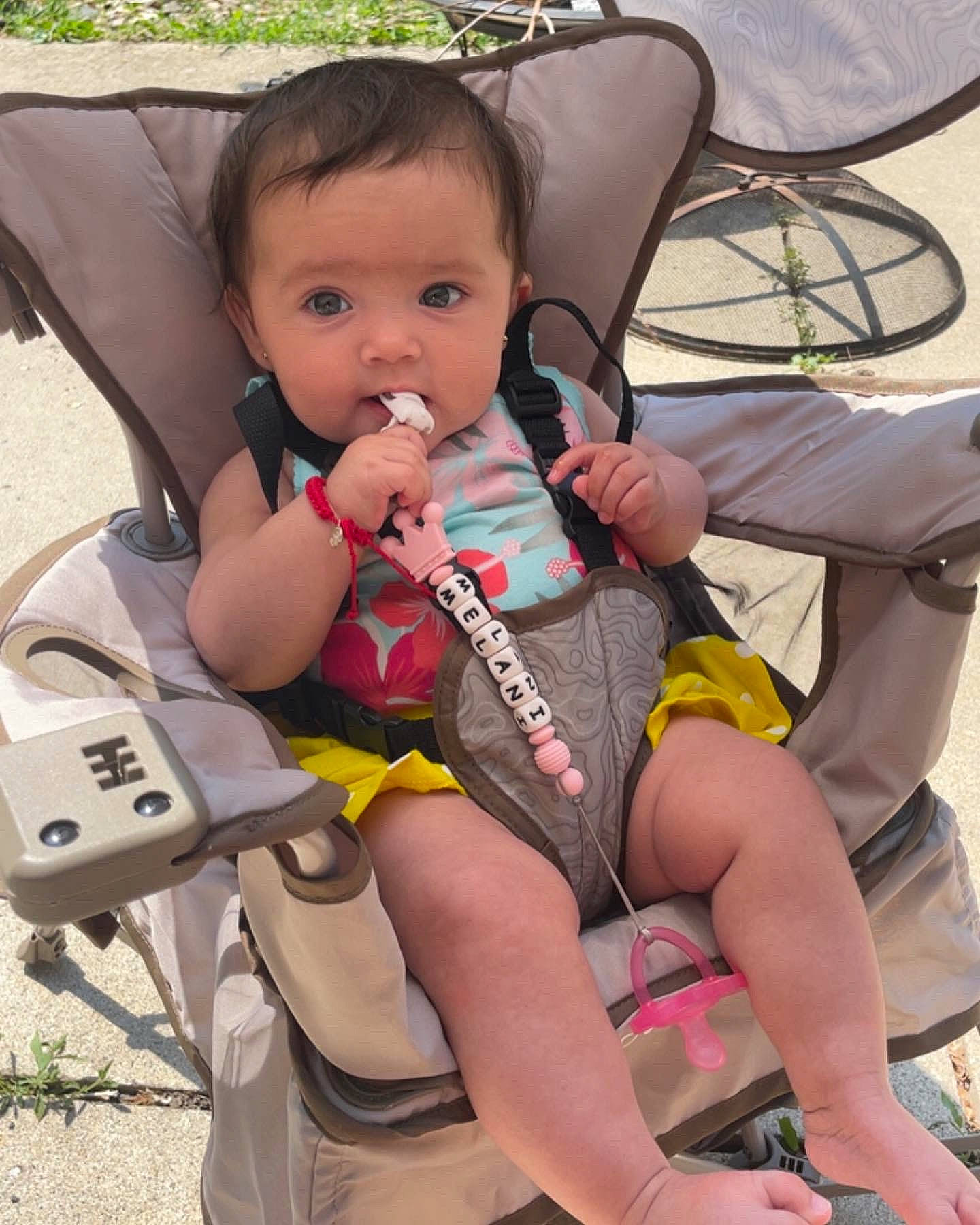 Melani is registered to the contest to win money with this photo: baby, baby_carriage, baby_products, baby_toddler_clothing, chair, child, comfort, fun, human_leg, knee, lap, leisure, nail, person, product, recreation, sitting, skin, thigh, toddler