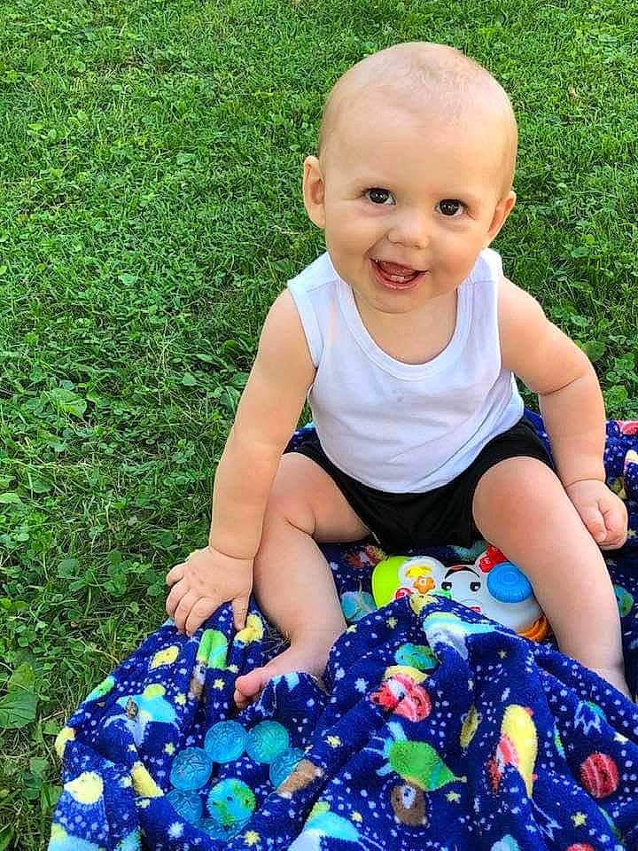 Bradley joined the competition — help win amazing prizes! baby, baby_products, baby_toddler_clothing, child, grass, joy, pattern, person, plant, play, sitting, toddler