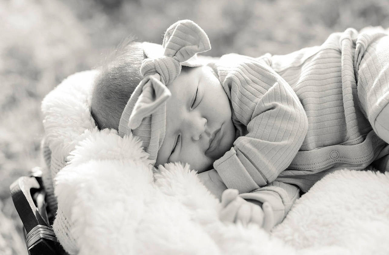 Madelyn joined the competition — help win amazing prizes! baby, black_and_white, child, comfort, event, flash_photography, fur, gesture, grass, happy, headwear, hug, mammal, monochrome, monochrome_photography, people_in_nature, person, plant, sitting, stock_photography