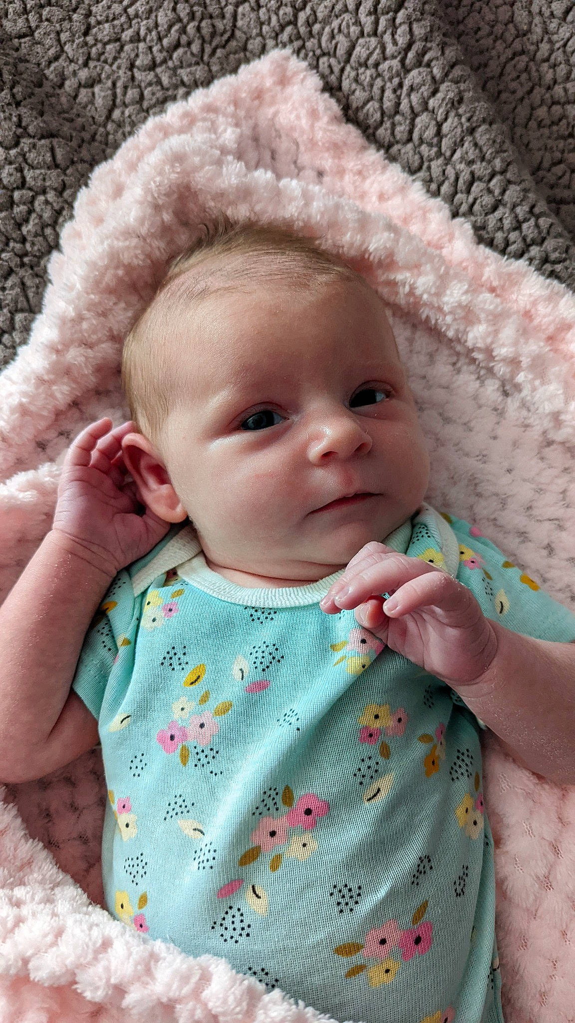 Shiloh is registered to the contest to win money with this photo: baby, baby_toddler_clothing, cap, cheek, chin, clothing, dress, eye, face, hand, head, iris, lip, nose, outerwear, person, pink, skin, sleeve, textile