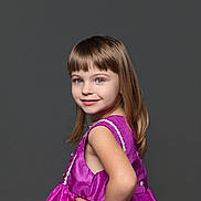 Shiloh joined the competition — help win amazing prizes! child, girl, portrait, dress, magenta, smile, posing, studio, background, happy, young, cute, fashion, person, human, hair, confident, sleeveless, elegant, childhood