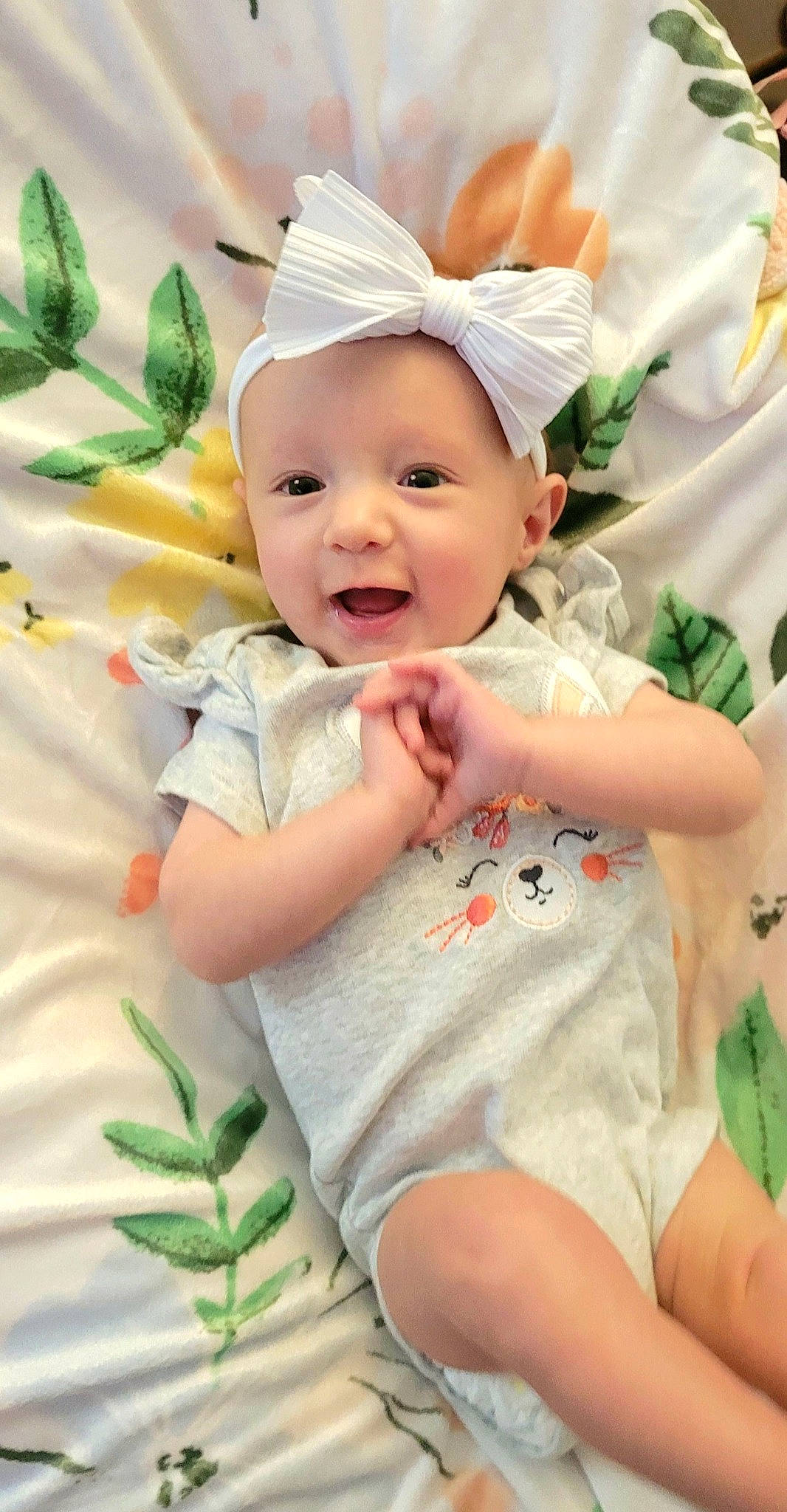 Kinsley joined the competition — help win amazing prizes! arm, baby_toddler_clothing, eye, face, facial_expression, finger, gesture, grass, happy, head, human_body, organ, person, pink, plant, skin, sleeve, smile, textile, toddler