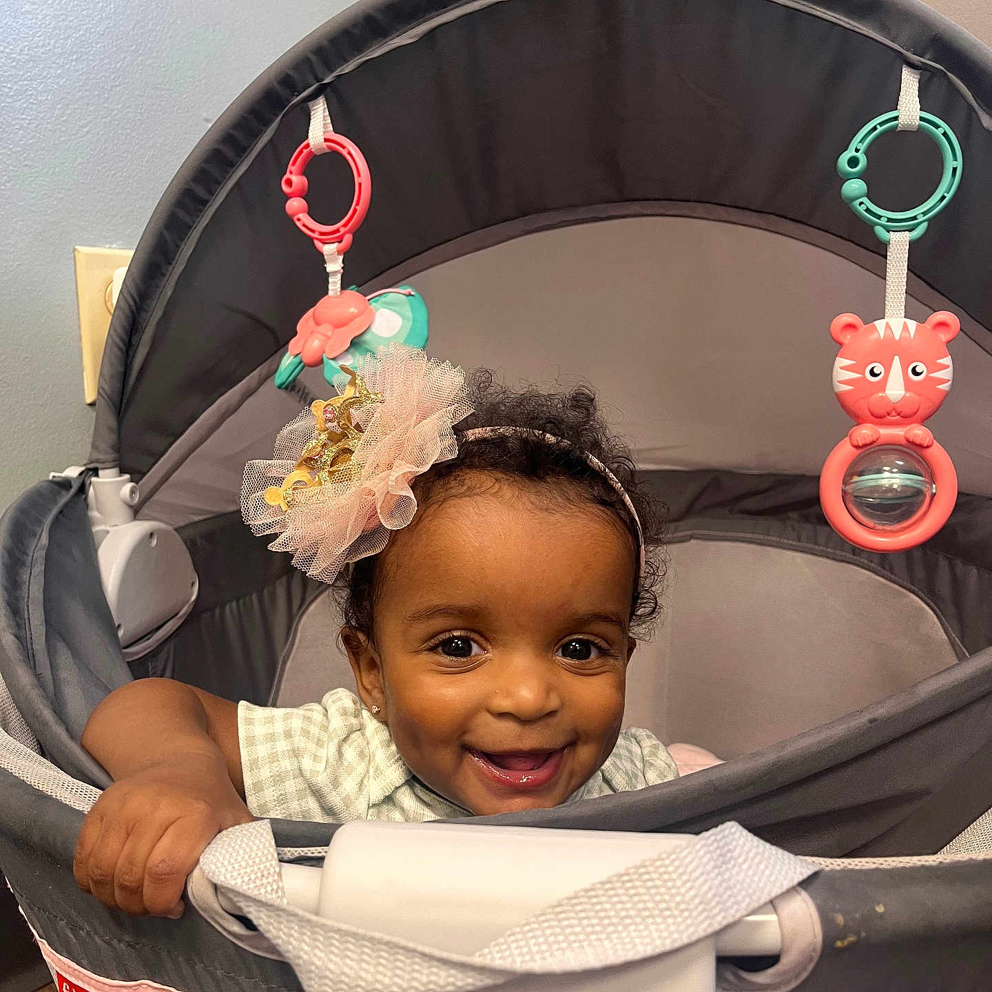 Eliyah is registered to the contest to win money with this photo: accessories, baby, babylaughing, bag, clothing, crib, earring, face, furniture, handbag, happy, hat, head, infantbed, jewelry, person, photography, portrait, smile, sunglasses
