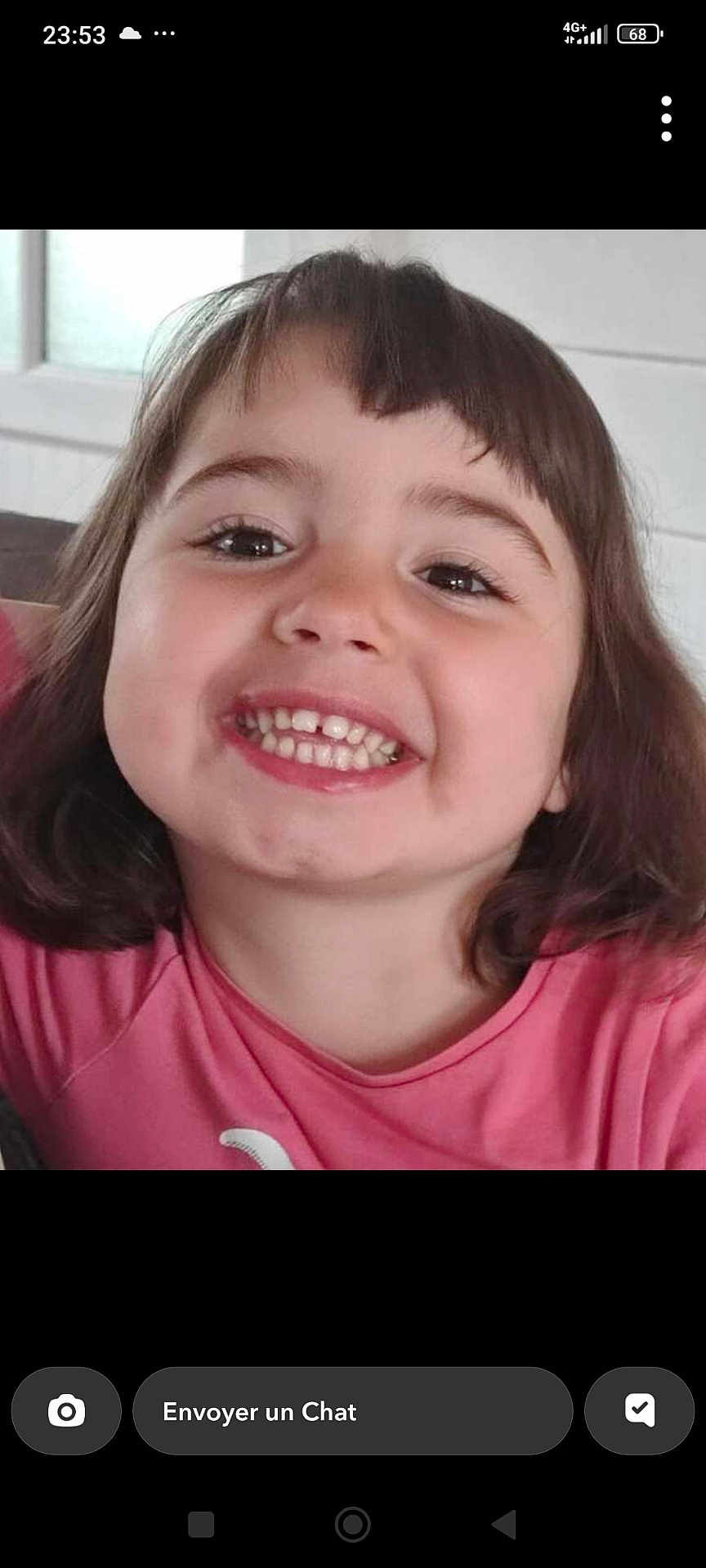 Phylomene participe au concours pour gagner de l'argent avec cette photo : child, smiling, face, portrait, happy, girl, hair, indoors, pink_shirt, teeth, expression, person, cute, head, young, childhood, closeup, human, cheerful, casual