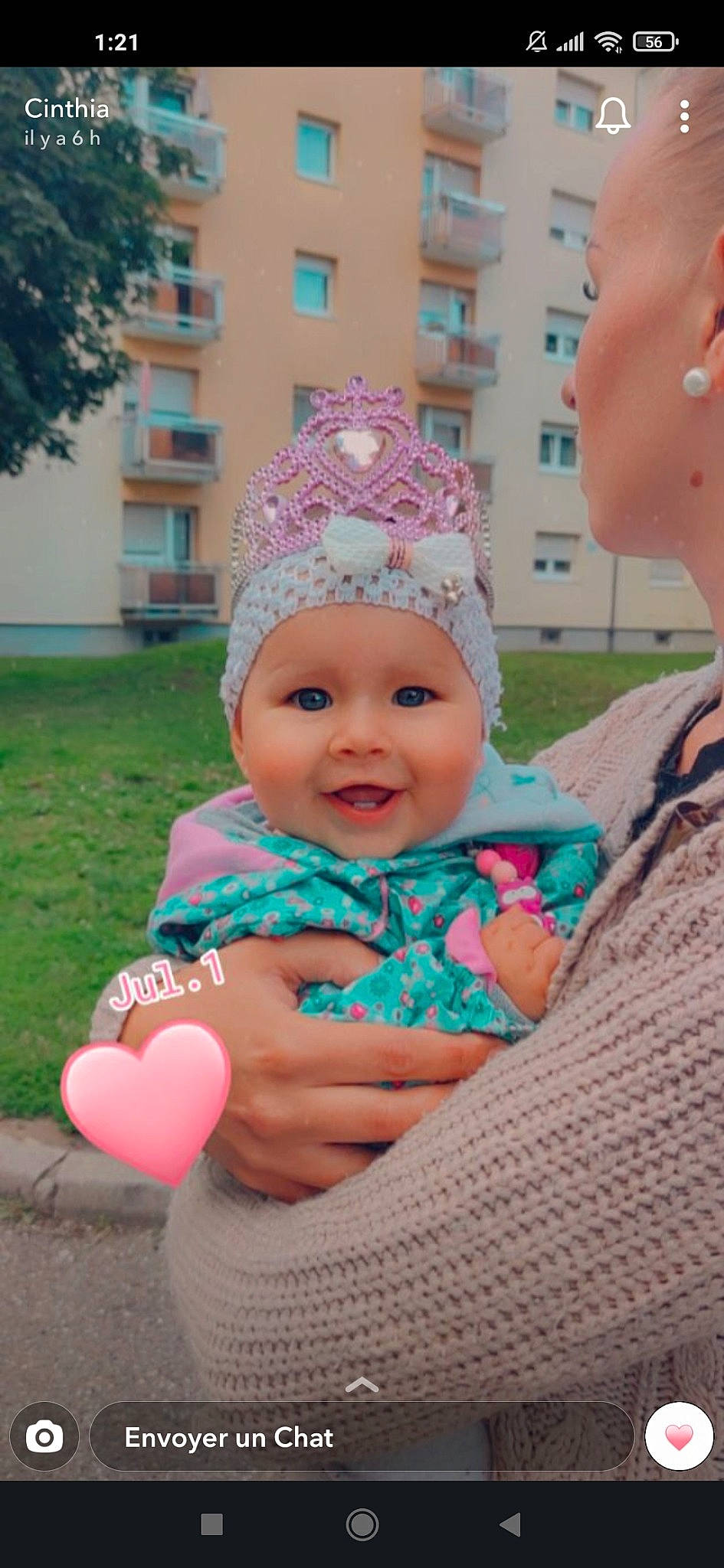 Vanina participe au concours pour gagner de l'argent avec cette photo : baby, baby_toddler_clothing, cap, child, event, facial_expression, fun, grass, happy, headwear, leisure, magenta, person, pink, purple, recreation, sitting, skin, smile, summer