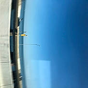 Royal is registered to the contest to win money with this photo: air_travel, aircraft, airline, airplane, azure, door, electric_blue, flap, gas, glass, machine, metal, reflection, shadow, sky, tints_and_shades, tower, water, wing, wood