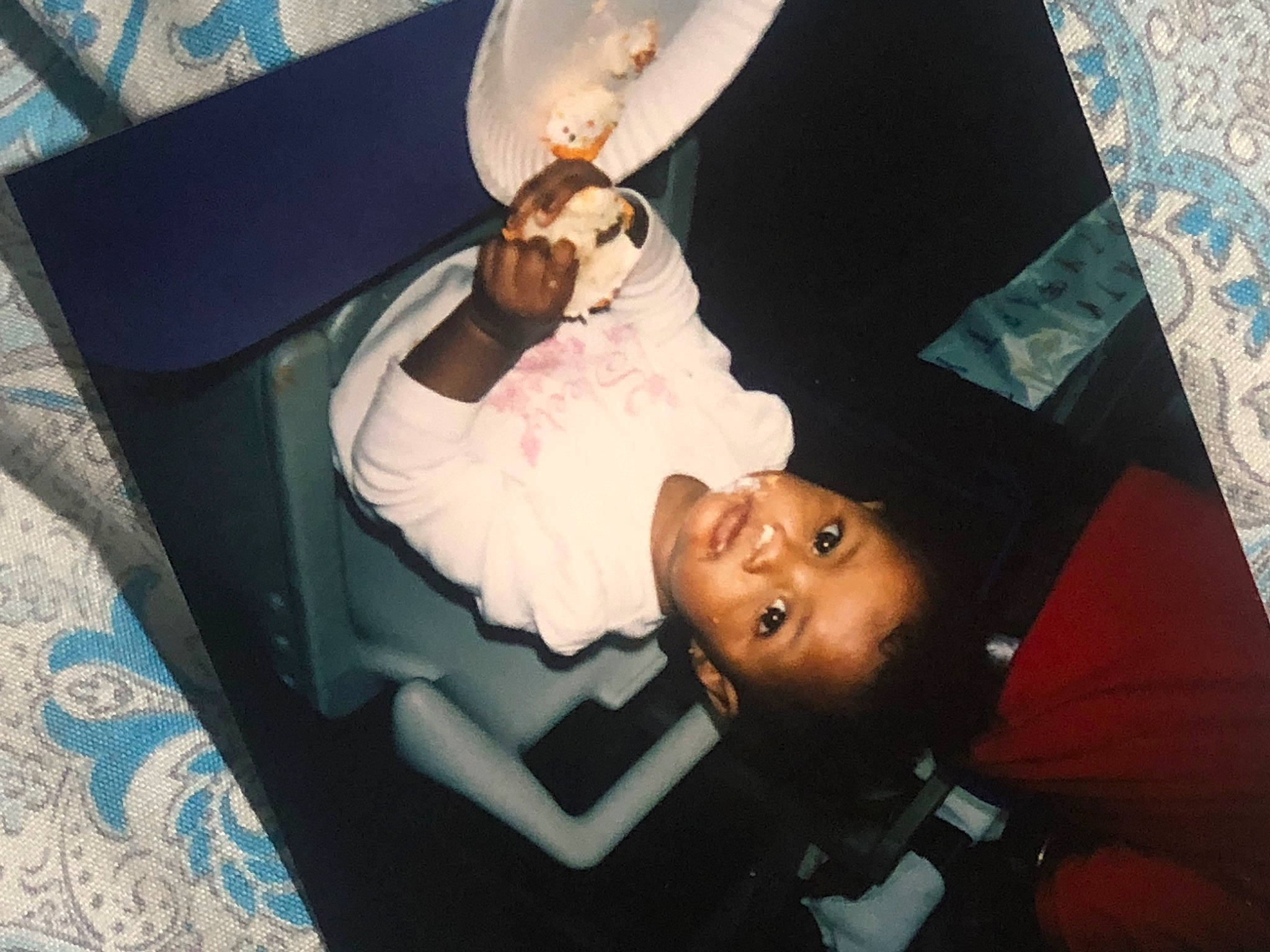 Nia is registered to the contest to win money with this photo: baby, child, comfort, event, eyewear, fashion_accessory, fun, happy, leisure, linens, person, room, sitting, toddler, vacation