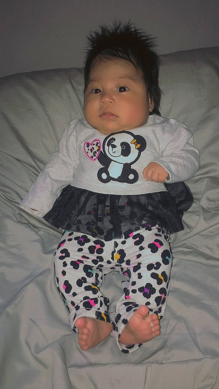 Galilea is registered to the contest to win money with this photo: baby, baby_toddler_clothing, child, pajamas, person, pink, toddler