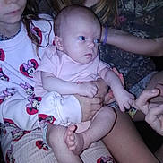 Maelynn joined the competition — help win amazing prizes! attentive_expression, baby, child, couch, face, feet, flash_photography, hair, hands, holding, indoor, infant, minnie_mouse, necklace, onesie, pajamas, patterned_clothing, portrait, siblings, toes