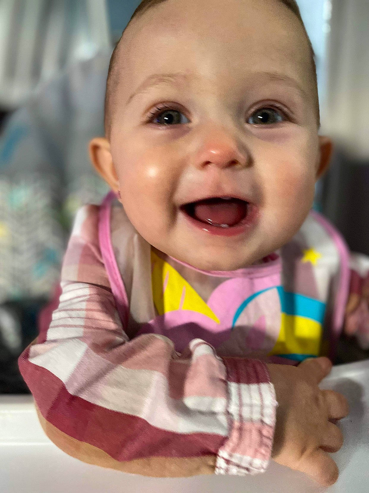Novalee is registered to the contest to win money with this photo: baby, baby_laughing, baby_products, baby_toddler_clothing, cheek, child, chin, finger, fun, gesture, happy, iris, mouth, nose, person, pink, product, skin, sleeve, smile