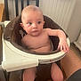 Louis a rejoint le concours — aidez-le/la à gagner de superbes lots ! baby, child, indoor, high_chair, seat, furniture, curious, looking_away, skin, person, bare_chest, legs, hand, wooden_chair, radiator, papers, floor, brown, white, cushion