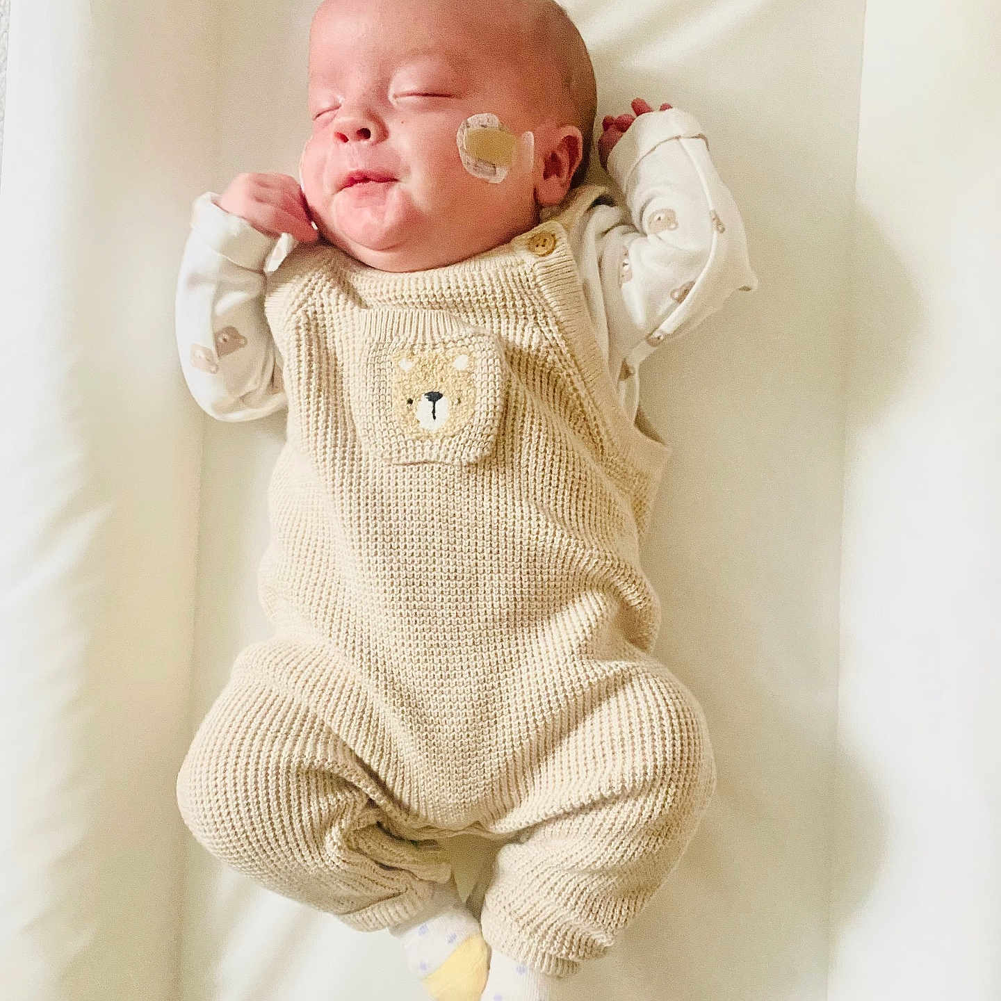 Hefin joined the competition — help win amazing prizes! baby, bed, blanket, clothing, cradle, crib, face, furniture, head, infantbed, knitwear, newborn, person, photography, portrait, sleeping, sleeve, sweater