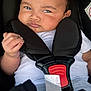 Aylann a rejoint le concours — aidez-le/la à gagner de superbes lots ! baby, black_background, buckle, car_seat, cheek, close_up, expression, eyes, face, fingernail, hand, harness, head, infant, mouth, portrait, seat_padding, seatbelt, skin, white_onesie