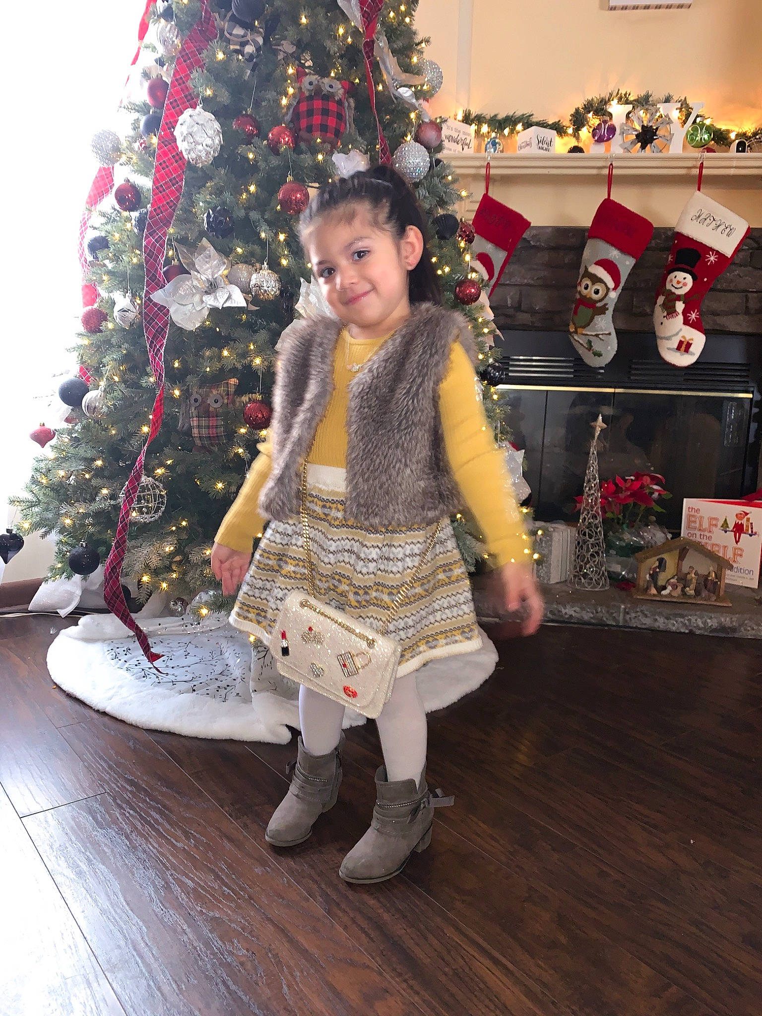 Ariannah joined the competition — help win amazing prizes! child, christmas, christmas_decoration, christmas_eve, christmas_ornament, christmas_tree, dress, event, holiday, interior_design, joy, person, tradition
