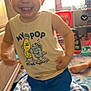 Anthony is registered to the contest to win money with this photo: toddler, child, smiling, indoor, tank_top, blue_shorts, toys, blanket, carpet, furniture, face, person, happy, playful, clothing, room, floor, barefoot, young_child, cute