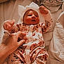 baby, bed, blanket, bonnet, childbirth, clothing, crib, face, furniture, happy, hat, head, infantbed, newborn, person, photography, portrait, quilt, sleeping, smile