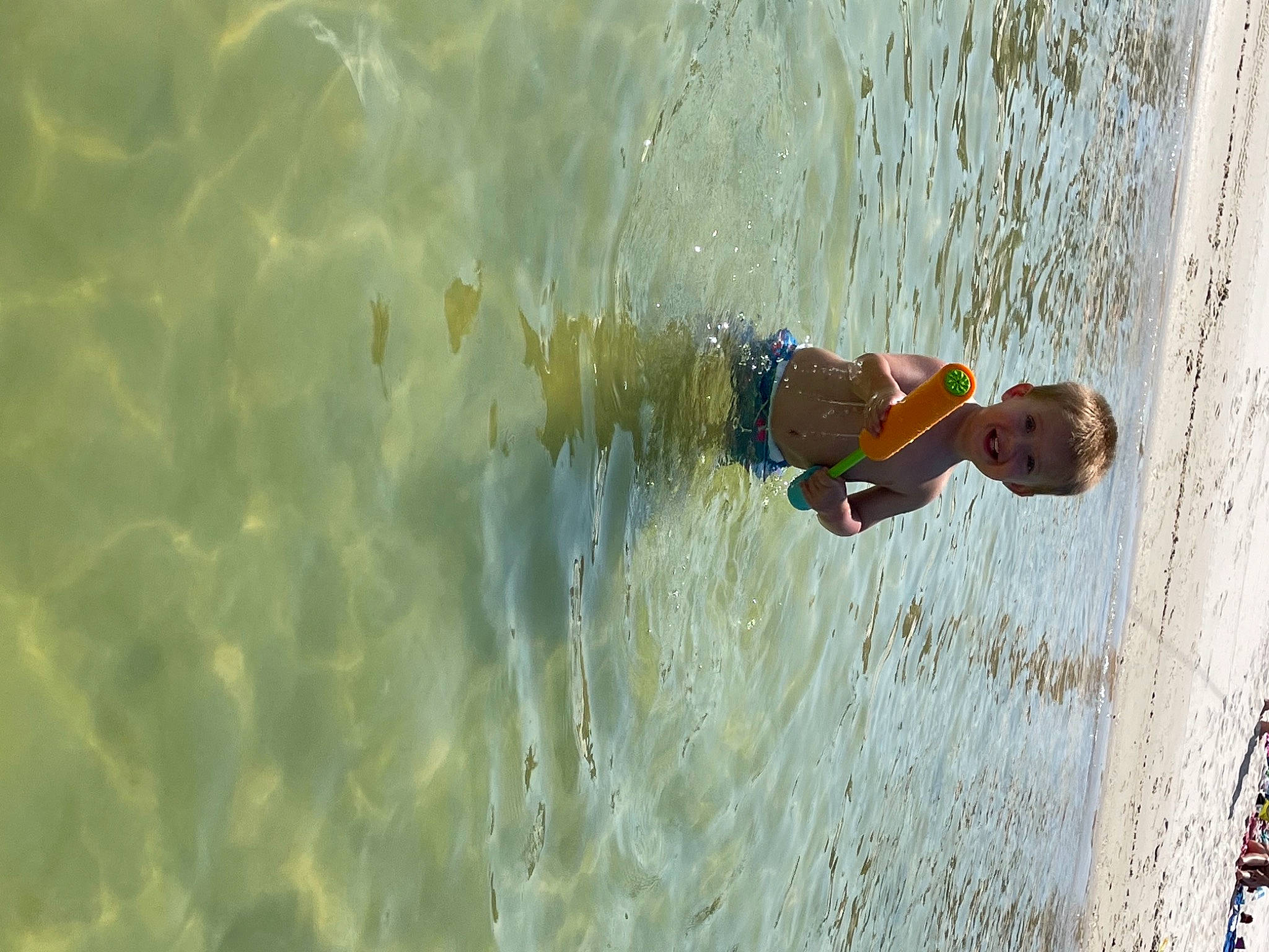 Kalvin joined the competition — help win amazing prizes! beach, child, coast, fluid, fun, lake, leisure, ocean, outdoor_recreation, person, play, recreation, sand, sports, tide, toddler, tree, water, wave, wind_wave