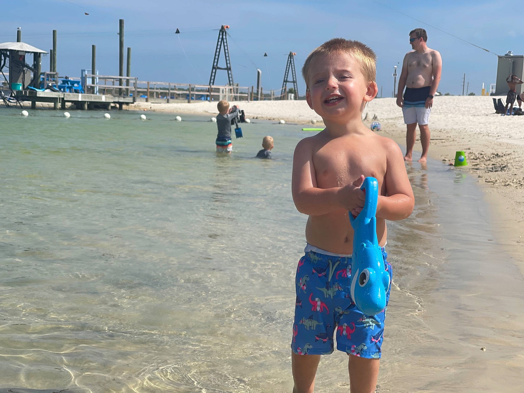 Kalvin joined the competition — help win amazing prizes! azure, barechested, beach, board_short, chest, daytime, fun, happy, joy, leisure, people_on_beach, person, recreation, shorts, sky, smile, summer, swimwear, toddler, travel